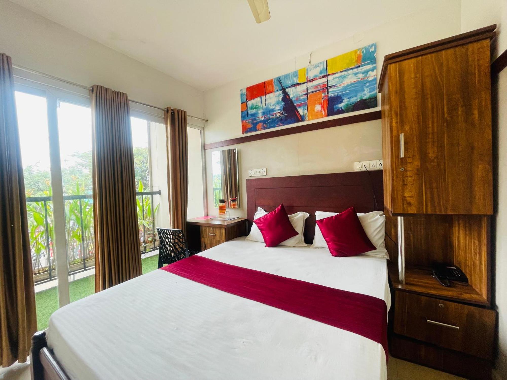 Rio Rooms Mims Calicut Exteriör bild
